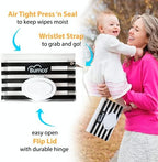 Open flip-top lid of Bumco portable wipes dispenser showing internal compartment