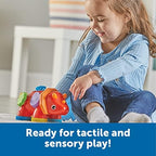 Montessori inspired dinosaur fidget companion highlighting the integrated spinning wheels