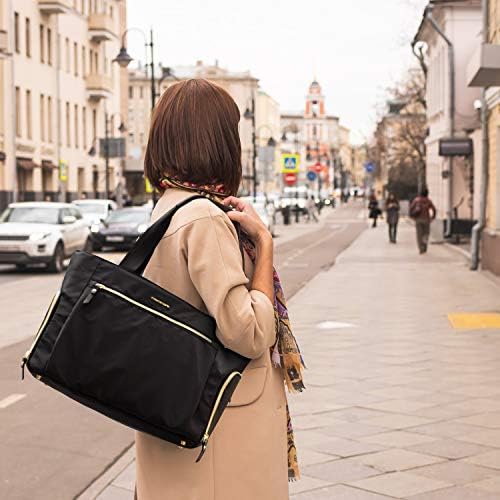 Mommore breast pump bag showing side opening compartment with pump