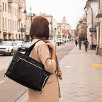 Mommore breast pump bag showing side opening compartment with pump
