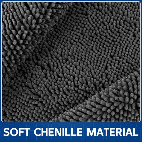 Naturei washable door mat being placed in a residential indoor entryway setting.