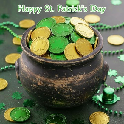 Close up of plastic shamrock lucky coins showing embossed three leaf clover details.