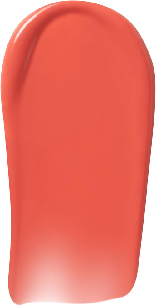Close up of the rounded grooved applicator tip coated in high pigment orange pink liquid blush.