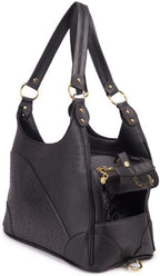 Gold-tone hardware and button pockets on Glield pet purse