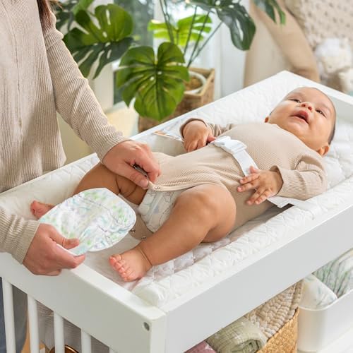 Ingenuity waterproof changing pad with removable cotton liner on changing table