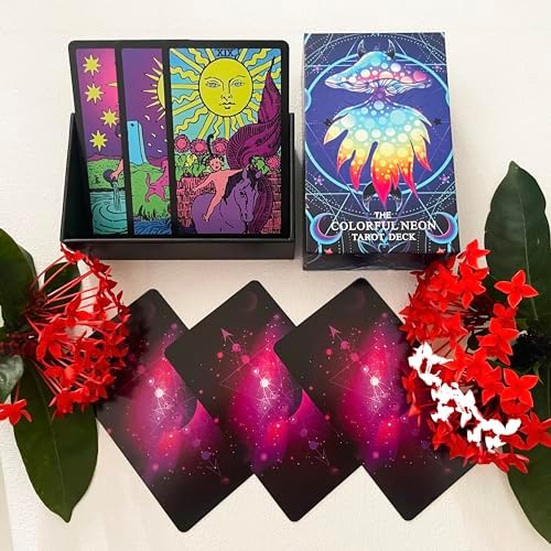 Spread of neon tarot cards showing classic symbolism