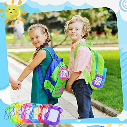 Child using portable magnetic doodle board on backpack