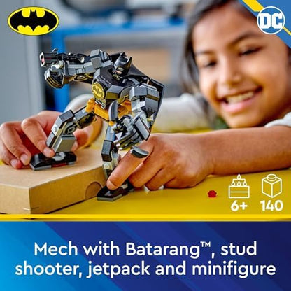 Close up of the LEGO Batman minifigure with a fabric cape sitting inside the opening cockpit of the mechanical armor