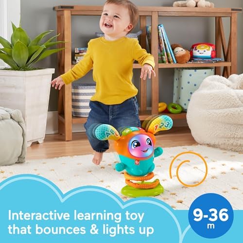 Fisher-Price toddler learning toy bouncing base with colorful lights active