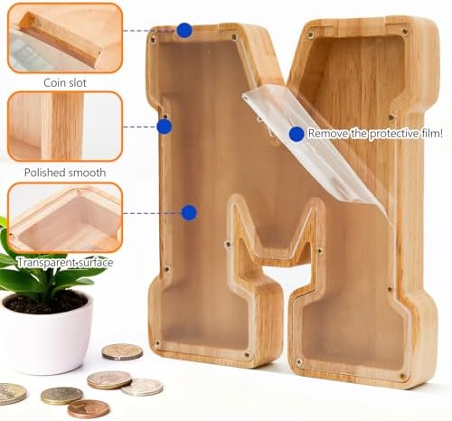 Personalized solid wood money box for kids displayed on a nursery room shelf.