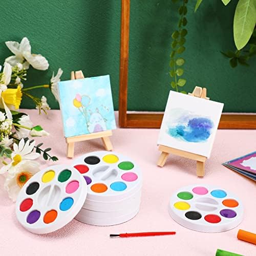 Close up view of the eight color round watercolor palette tray and refillable water storage brush