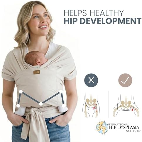 TAB PERFORMANCE ergonomic infant wrap carrier in beige fabric being adjusted