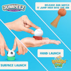 Multiple colorful rubber sports rocket poppers scattered for party game display