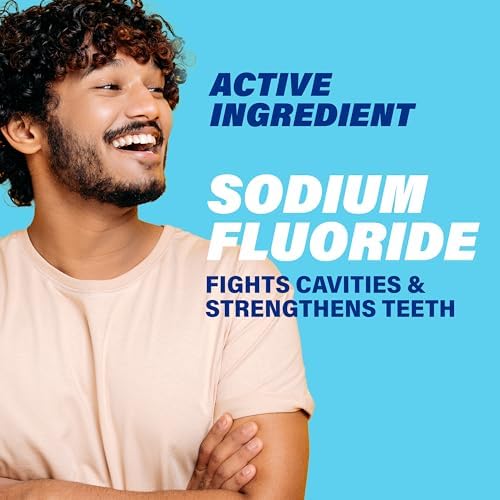 ACT mint flavor alcohol free mouthwash displaying the liquid color and clear bottle design