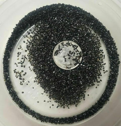 Black aquarium sand substrate used in freshwater aquascaping