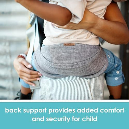 Compact travel baby sling folded neatly next to a diaper bag