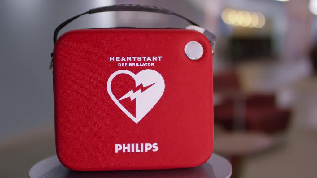 Portable HeartStart OnSite medical device for workplace emergency response.
