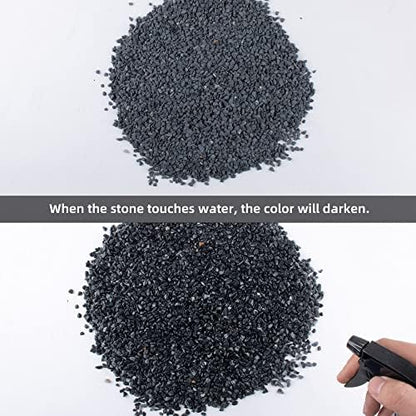 Smooth black river rocks arranged in a decorative glass vase