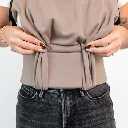 Side view of ergonomic baby wearing carrier for newborns
