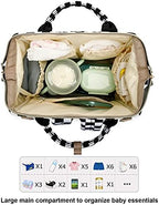 Yusudan mom backpack attached securely to stroller using included straps