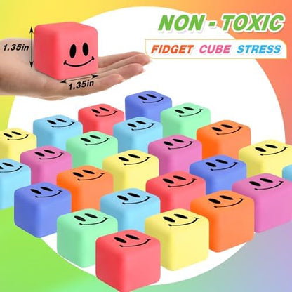 A hand squeezing a single slow-rising square ice cube stress ball to demonstrate its squishy texture.
