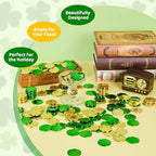 Festive clear glass vase filled with green and gold luck tokens