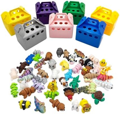 Assorted 3D printed flexible animal fidget toys on desk