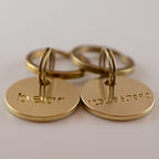 Uncoated solid brass pet identification tag with a beautiful natural patina