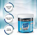 Professional barber cleaning clippers in Andis dip jar