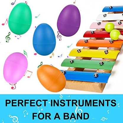 COCOMOON early learning percussion set showing dimensions relative to an ordinary egg