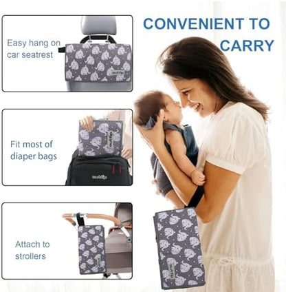Folded portable baby changing station inside a diaper bag