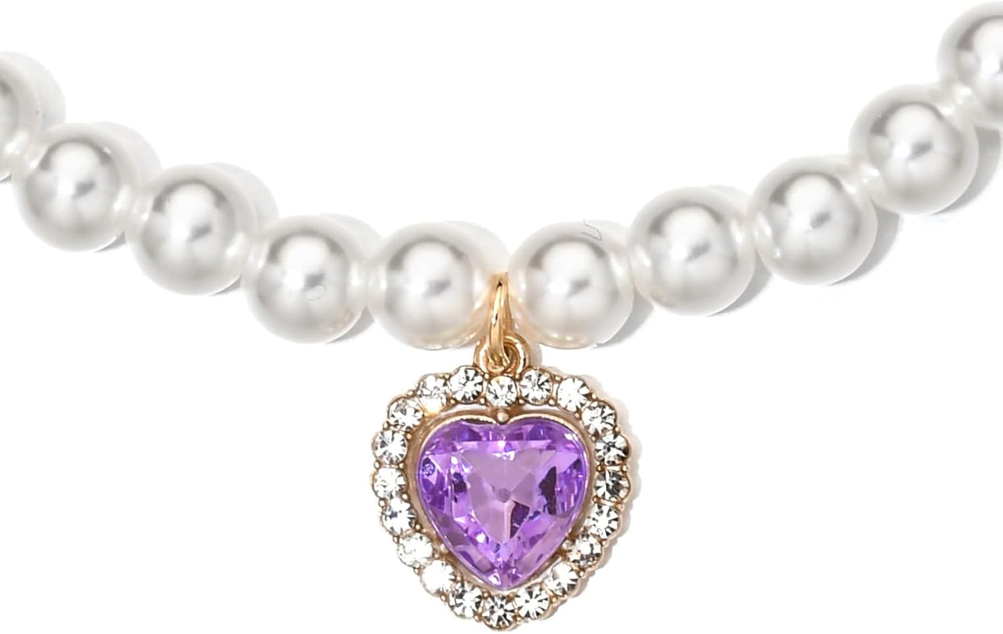 Close up of sparkling rhinestone heart pendant on pet collar