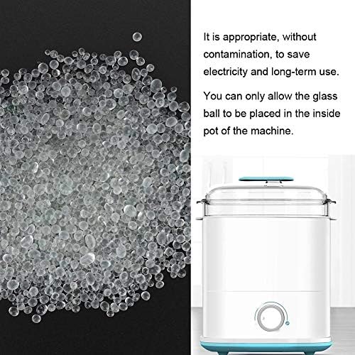 Glass beads being poured into a professional metal sterilizer pot