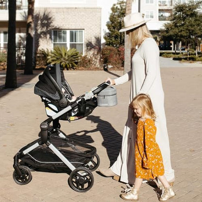 Nanobebe baby bottle travel bag attached to a stroller