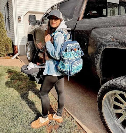 Wrangler travel baby bag showcasing the three insulated thermal bottle pockets.