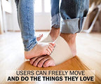 Side view of beige arch support band on a foot showing slim profile.