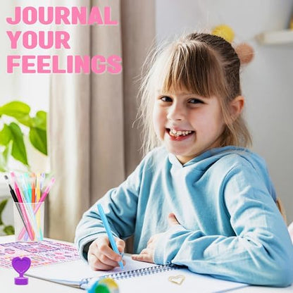 Teen girl decorating her diary with glitter tape and alphabet stickers