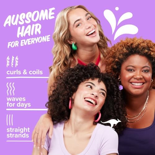 Close up shot of Aussie Total Miracle hair spray emphasizing the pump dispenser mechanism