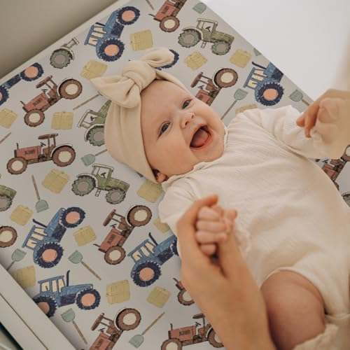 Elastic band detail for secure fit on changing pad