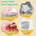 H&W small pink money container being held by a child to show its compact toddler friendly size.