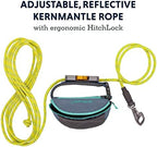 Pet parent wearing the multi use dog hitching belt around the waist while hiking.
