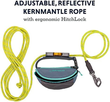 Pet parent wearing the multi use dog hitching belt around the waist while hiking.