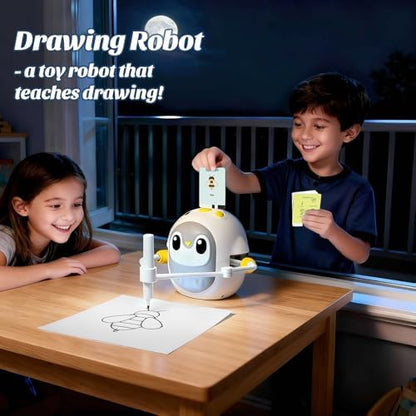 Montessori learning drawing machine with flashcards spread out next to colored pencils