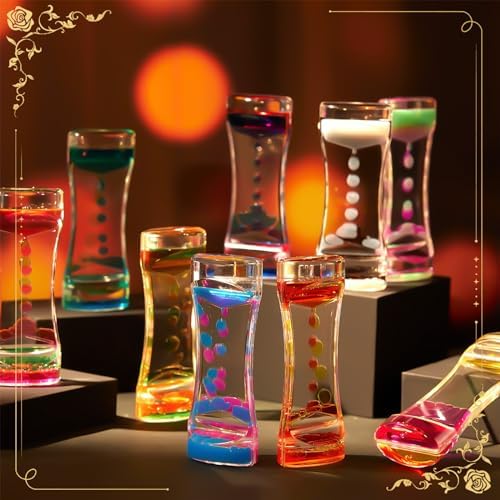 Eighteen pieces of colorful sensory fidget timers arranged neatly on a desktop for autism calming therapy
