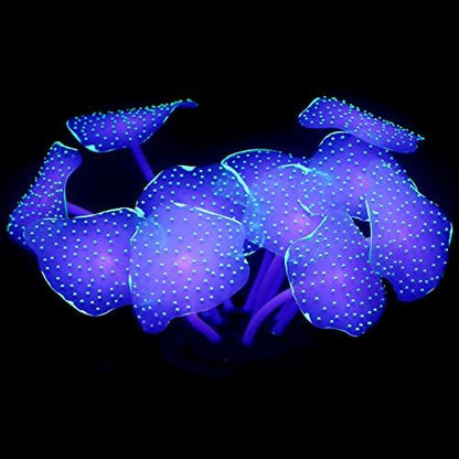 Uniclife glowing artificial coral plant decoration inside a fish tank under blue light
