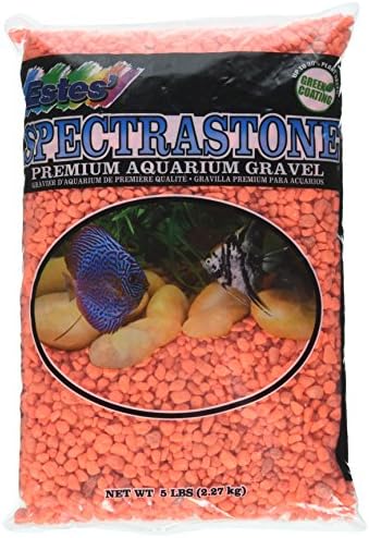 Close up view of vibrant orange aquarium gravel granules