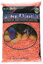 Close up view of vibrant orange aquarium gravel granules