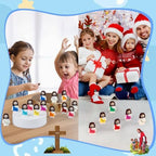Brightly colored mini baby jesus figurines spread out to show all forty pieces included in the bulk set.