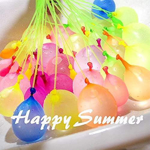 A large pile of freshly filled multicolored self sealing water balloons resting in a large plastic bucket for a summer party.