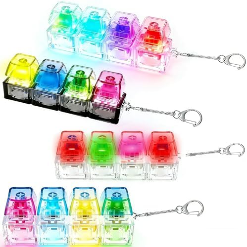Close up angle of a mini mechanical keyboard toy keychain illuminating bright light upon being pressed by a finger